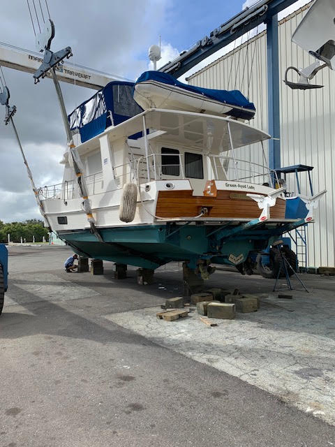 Trawler hauled out on a travel lift for scheduled maintenance