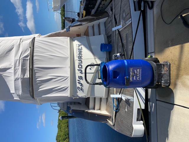 Universal Flush equipment staged on a yacht's swim platform