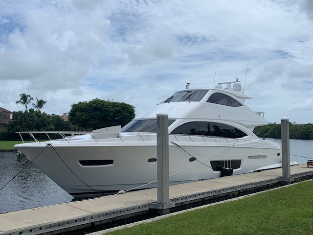 Motor yacht docked at a marina